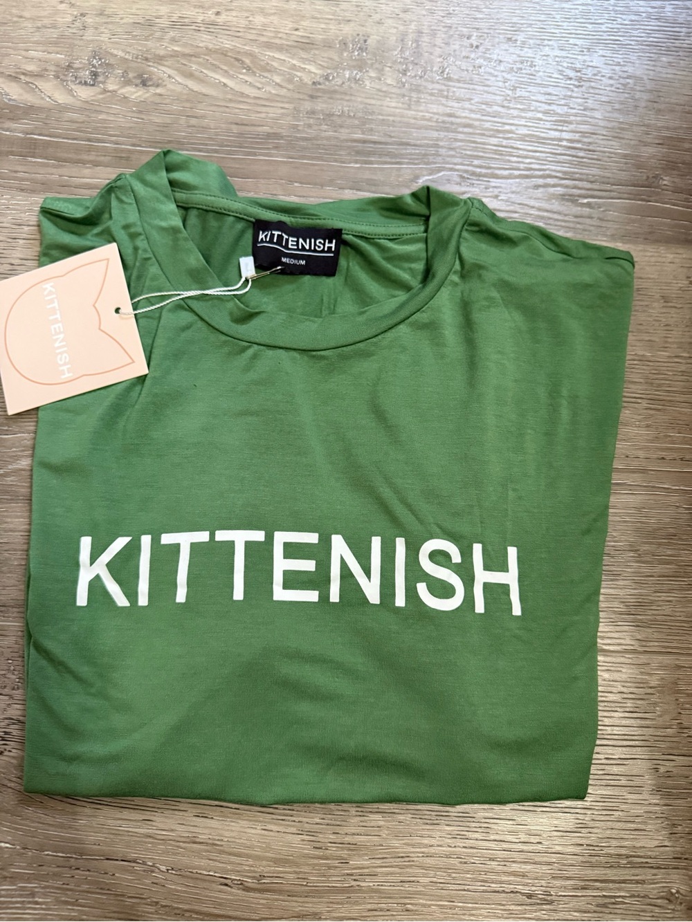 NWT Kittenish Green Crewneck Logo Tee. Extremely Soft size Medium